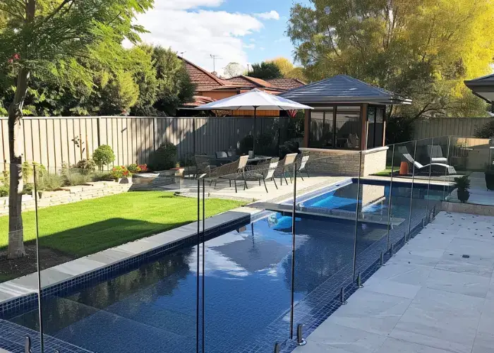 backyard in Ipswich with glass pool fence